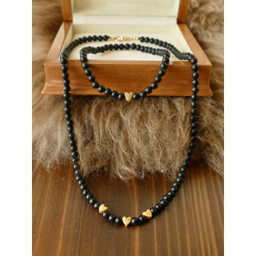 Edelsteinset bestehend aus schwarzer Kette und Armband